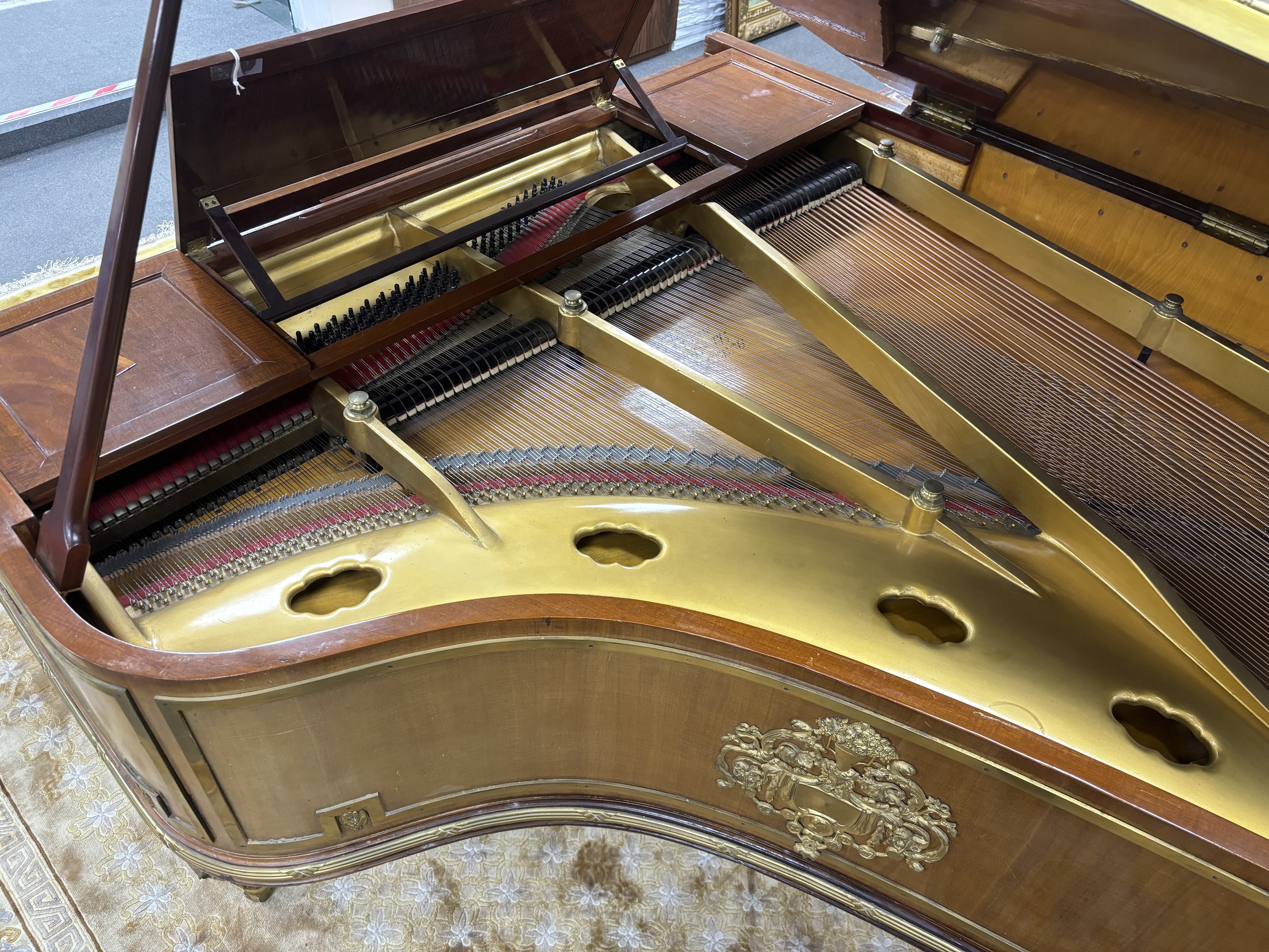 An Erard Louis XVI style mahogany and ormolu mounted boudoir grand piano, c1910 (ivory keys), length 180cm, depth 148cm, height 102cm together with a late Victorian mahogany duet piano stool, CITES Submission reference 5